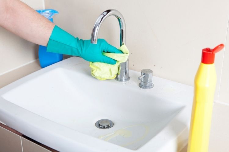 How to Caulk Around the Bathroom Sink Faucet