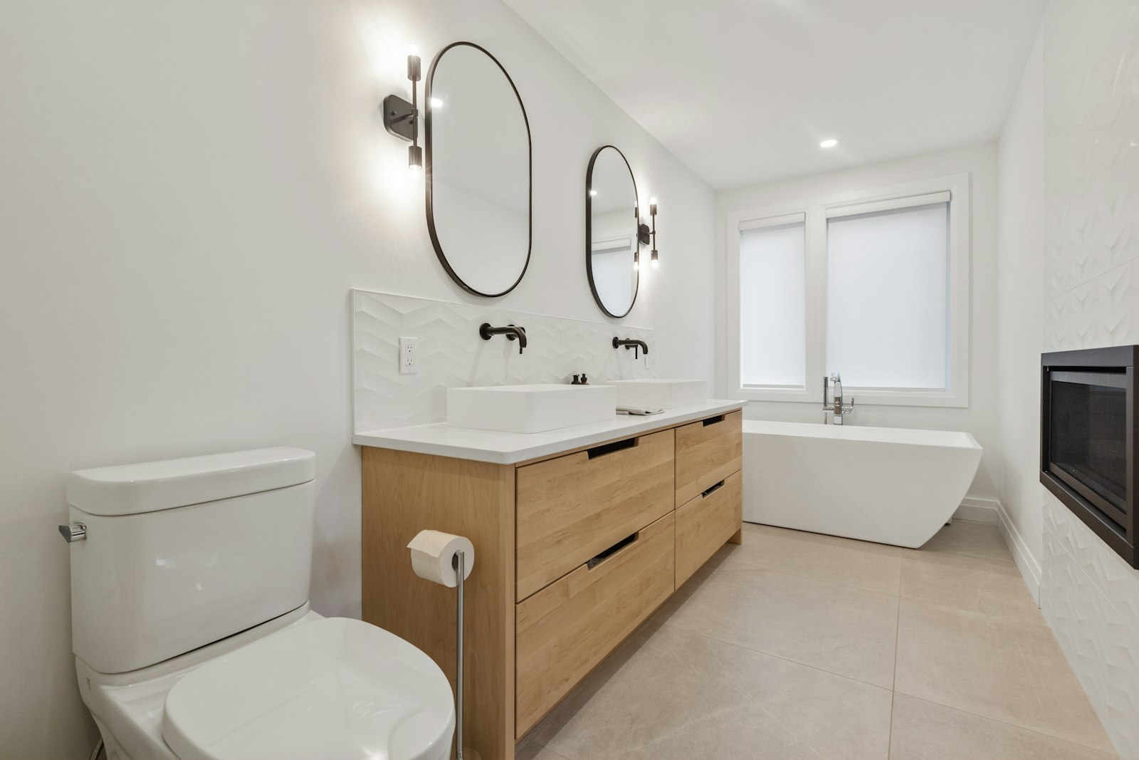 Comfort height toilet in a bright, modern bathroom