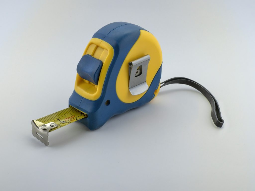 Measuring tape for checking a toilet rough-in